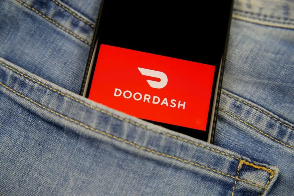Phone in a pocket with an open DoorDash app