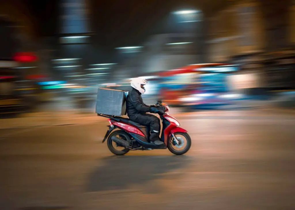 Food delivery guy on a motorcycle