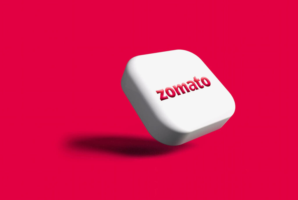  Zomato logo on a pink background