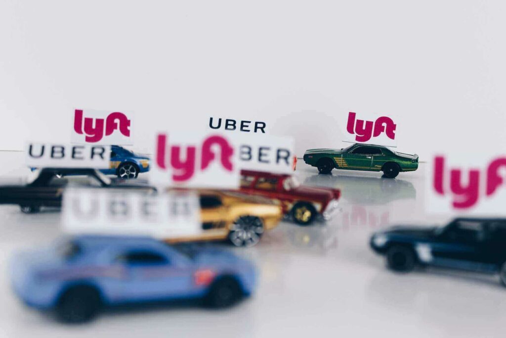 Cars with Uber or Lyft signs