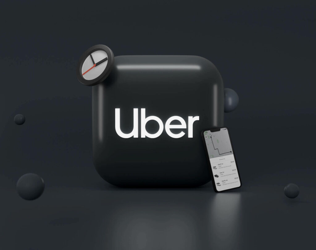 Uber logo next to a phone