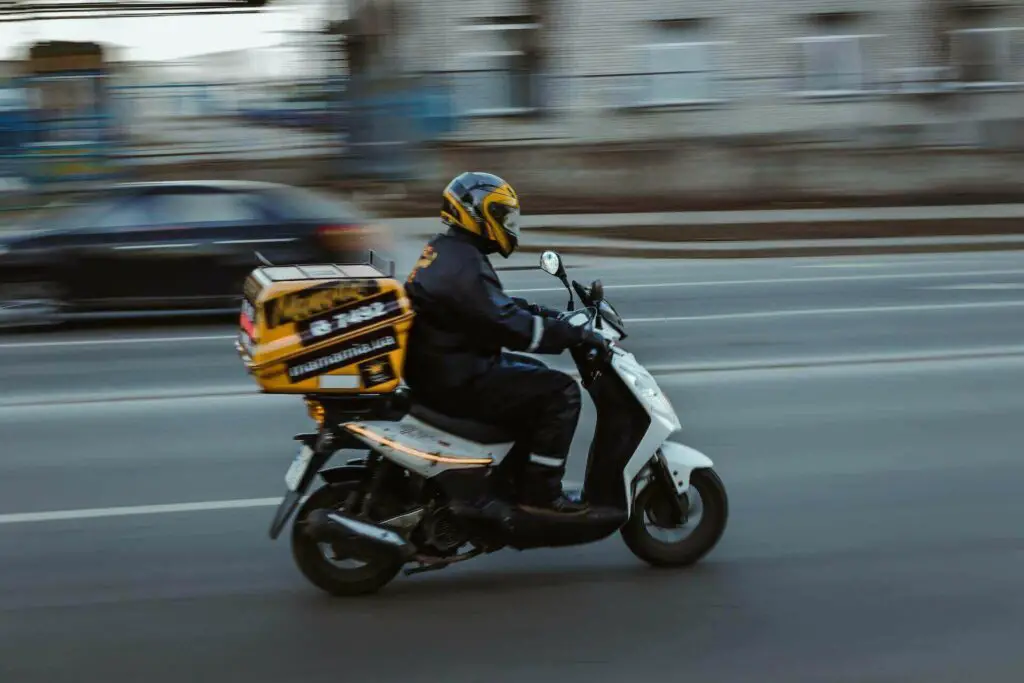  Delivery man riding a motorcycle